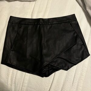 Black faux leather skort